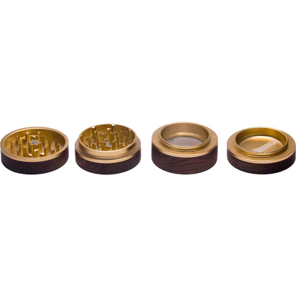 Four metallic Viking Axe grinder parts. Metallic gold interior and wood exterior. 